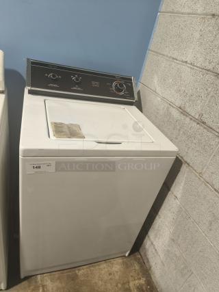 Whirlpool Top-Load Heavy Duty Washer, model LA5580XTW1, in good condition. Features easy access controls and durable build.
