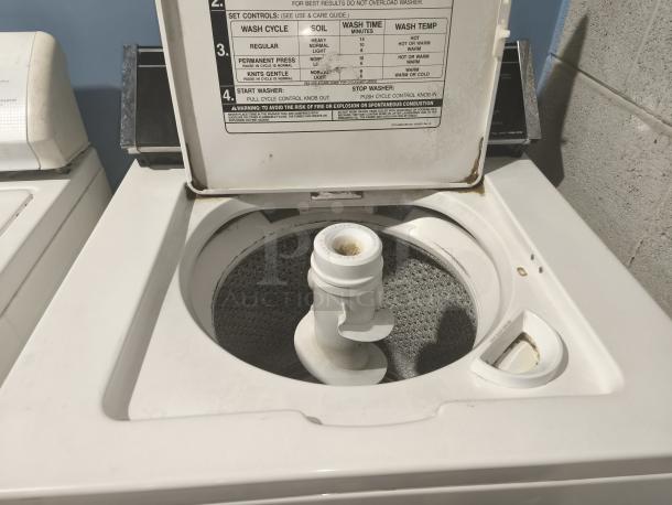Whirlpool Top-Load Heavy Duty Washer, model LA5580XTW1, open lid showing controls and agitator, good condition.