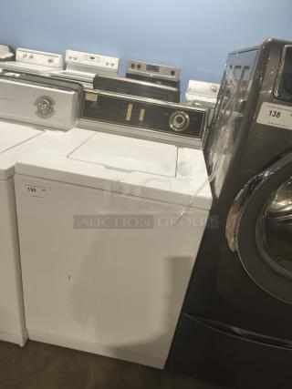 Maytag Washer Model A511, vintage machine with classic control panel, visible wear, and auction lot number tag.