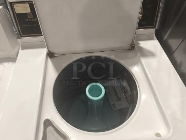 Maytag Washer Model A511, top-loading, white, visible rust on lid edges, includes hose.