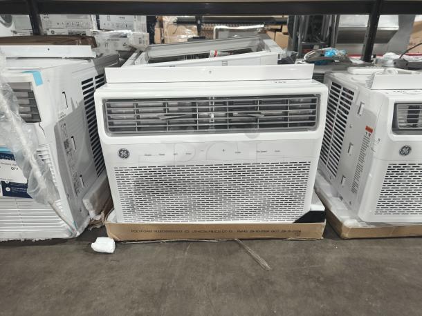 BRAND NEW GE AWFS10WWL 10,000 BTU Smart Electronic Window Air Conditioner, minor scratches, in original packaging.