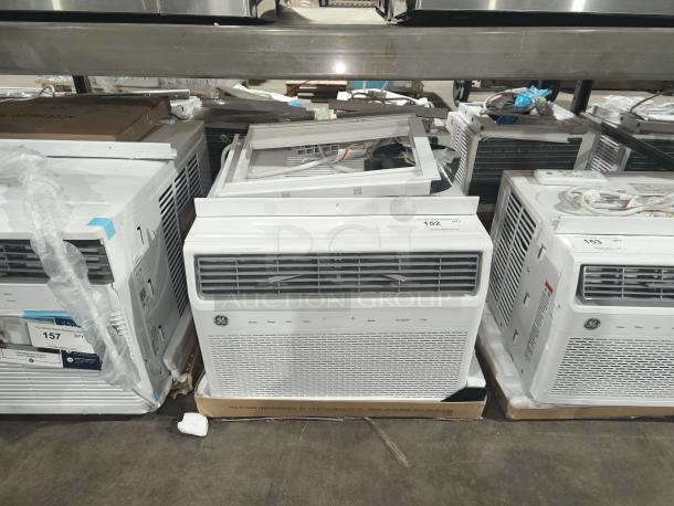 BRAND NEW GE 10,000 BTU Smart Electronic Window Air Conditioner, Model AWFS10WWL. Slight scratch and dent condition.