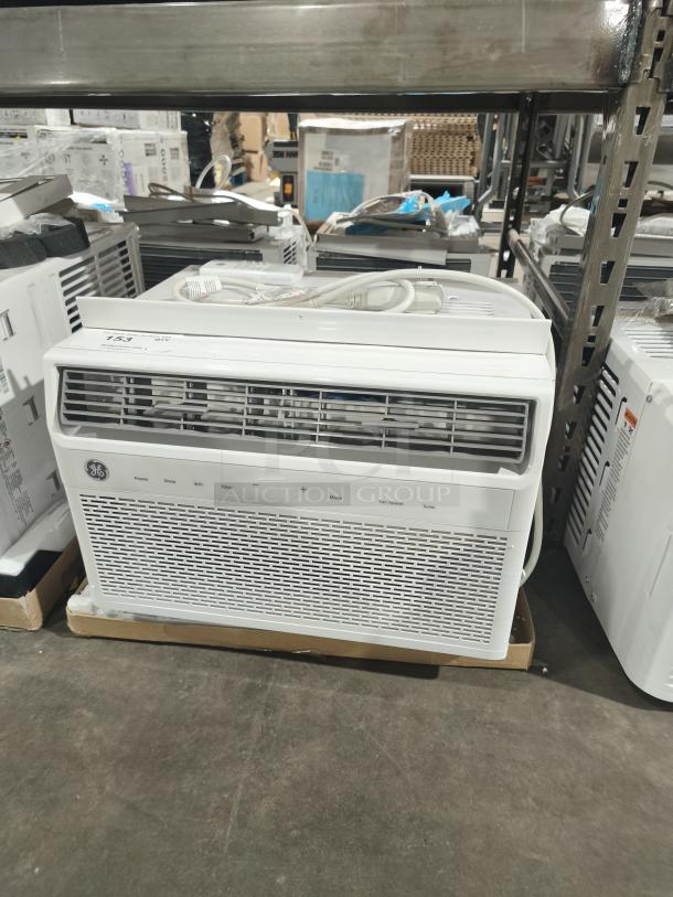 BRAND NEW GE 8,000 BTU window AC, model AWFS08WWL. Smart features, minor scratches, electronic controls, pristine condition.