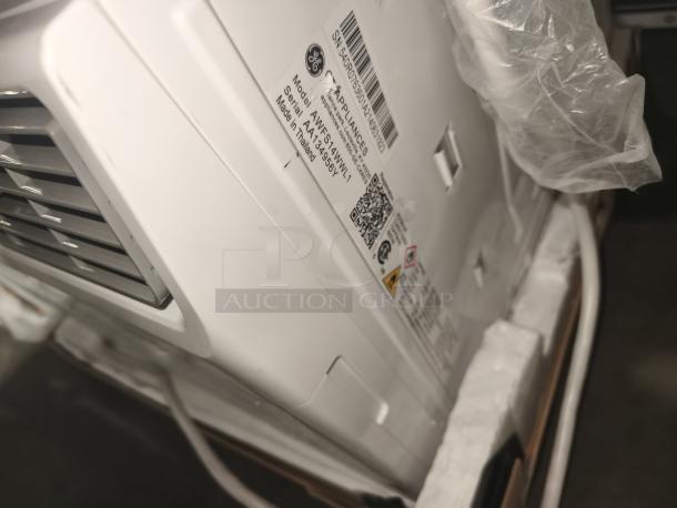 BRAND NEW GE Smart Window Air Conditioner, Model AWFS14WWL1, 14,000 BTU, slight scratches visible, label with specs present.