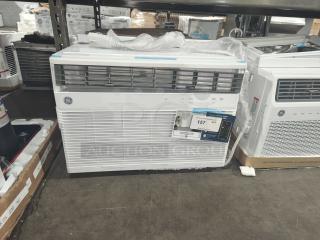 BRAND NEW GE Zoneline 12,000 BTU PTAC, model AZES12DCXXA, scratch and dent, cooling and electric heat, corrosion protection, tags visible.