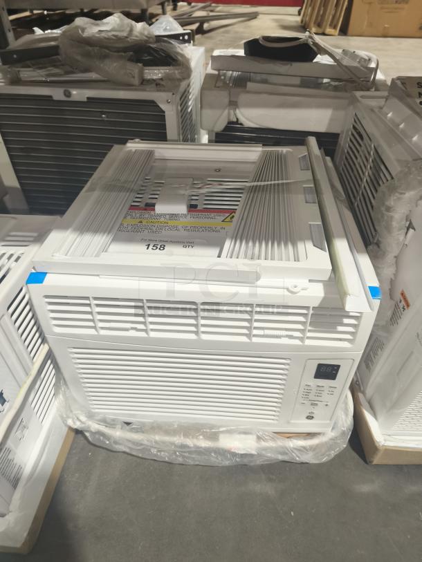 Brand new GE Zoneline 6,000 BTU air conditioner, model AHQ06LYCQ1, with electronic controls. Scratch and dent condition.