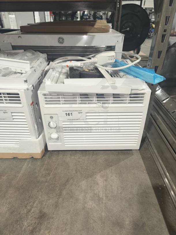 BRAND NEW GE 5000 BTU window AC, Model AWFS05BWL. Mechanical controls, slight cosmetic flaws, ideal for small rooms.