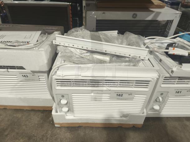 Brand new GE 5000 BTU mechanical window air conditioner, model AWFS05BWL, for small rooms up to 150 sq ft, scratch and dent.