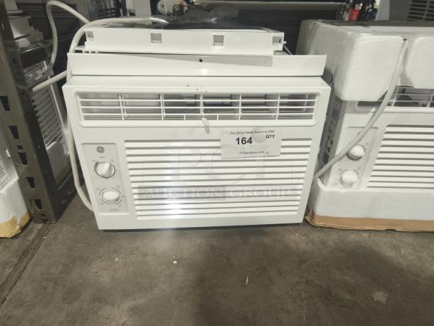 BRAND NEW GE 5000 BTU window air conditioner, model AWFS05BWL, minor scratches. Ideal for rooms up to 150 sq ft.