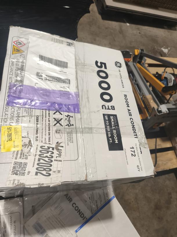 BRAND NEW GE 5000 BTU window air conditioner, model AWFS05BWL, for rooms up to 150 sq ft, in box with shipping labels.