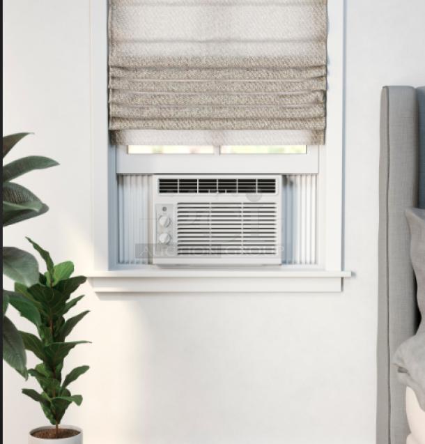 BRAND NEW GE 5000 BTU Window Air Conditioner, Model AWFS05BWL, for Small Rooms. Mechanical controls. Scratch and dent.