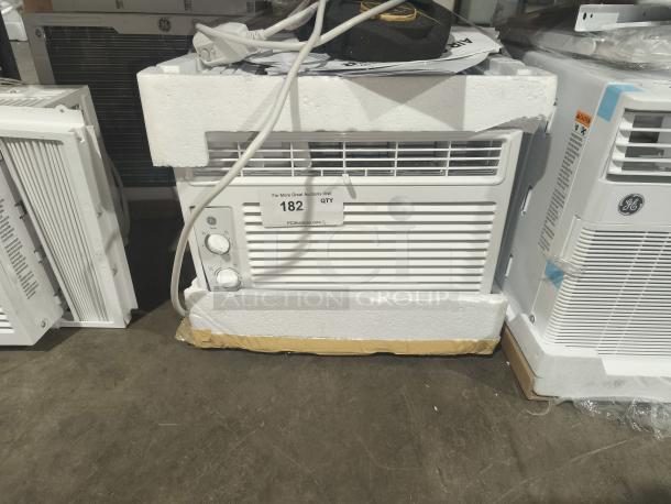 GE AWFS05BWL 5000 BTU window AC for small rooms, new scratch and dent, mechanical controls, boxed with label.
