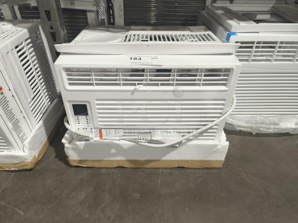 BRAND NEW GE 6,000 BTU window air conditioner, model AWFS06BWL, for small rooms. Scratch and dent, with electronic controls.
