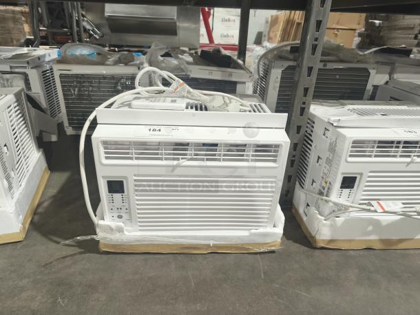 BRAND NEW SCRATCH AND DENT GE 6,000 BTU Electronic Window Air Conditioner, model AWFS06BWL, for small rooms.