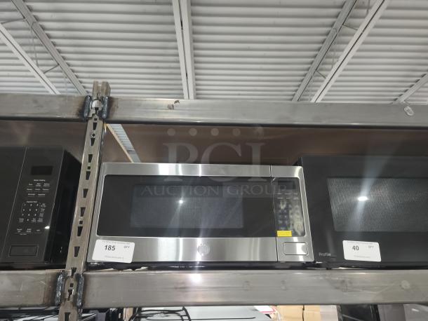 BRAND NEW GE Profile Countertop Microwave Oven, Model PEM31SFSS, 1.1 cu ft. Slight scratch and dent condition.