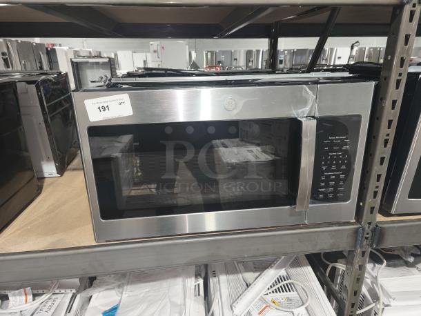 BRAND NEW SCRATCH AND DENT GE 1.6 cu. ft. Over-the-Range Microwave JNM3163RJ6SS, recirculating vent, slight damage, model tag visible.