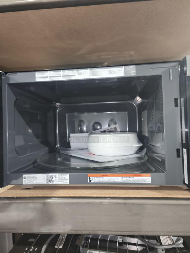 BRAND NEW GE 1.6 cu. ft. Over-the-Range Microwave, Model JNM3163RJ6SS, with recirculating venting, scratch and dent.