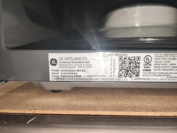 GE Over-the-Range Microwave, Model JNM3163RJ6SS, brand new, with recirculating venting. Serial: DA200069A. Manufactured: Feb 2025.