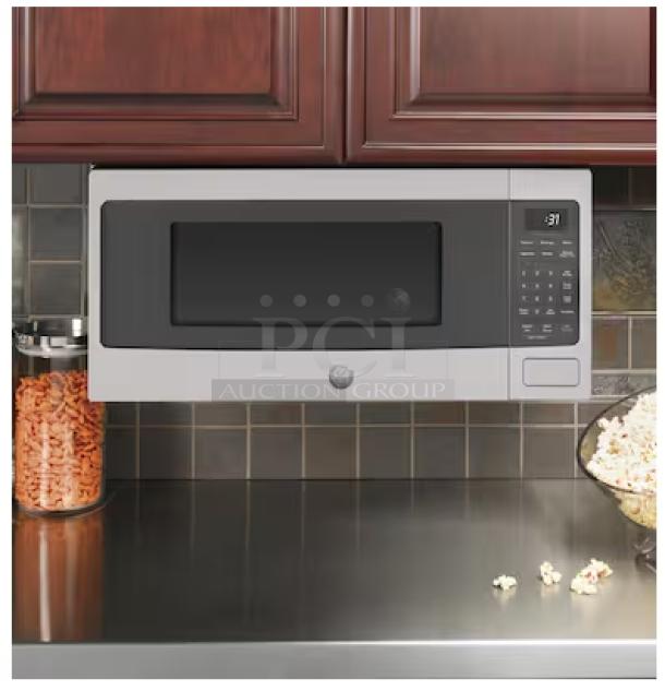 BRAND NEW GE Profile 1.1 cu. ft. microwave, model PCHK11S1WSS, with sensor cooking, scratch and dent condition.