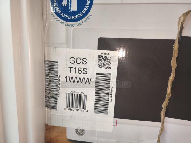 BRAND NEW SCRATCH AND DENT GE 1.6 cu. ft. countertop microwave, Model GCST16S1WWW, box with visible tear, UPC label shown.