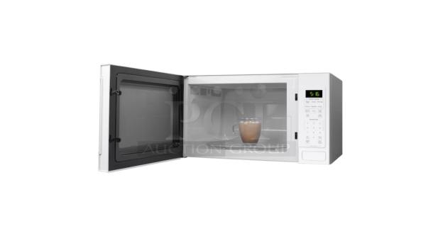 BRAND NEW GE 1.6 cu. ft. Countertop Microwave GCST16S1WWW, open door view, white, digital controls, minor scratches.
