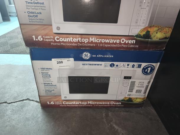 BRAND NEW SCRATCH AND DENT GE 1.6 cu. ft. Countertop Microwave Oven, Model GCST16S1WWW, 1150 Watts, sensor cooking.