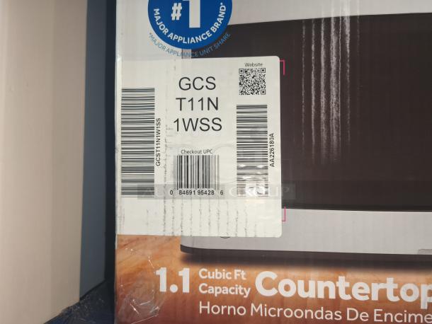 GE 1.1 Cu. Ft. Countertop Microwave Oven, model GCST11N1WSS, brand new scratch and dent condition.