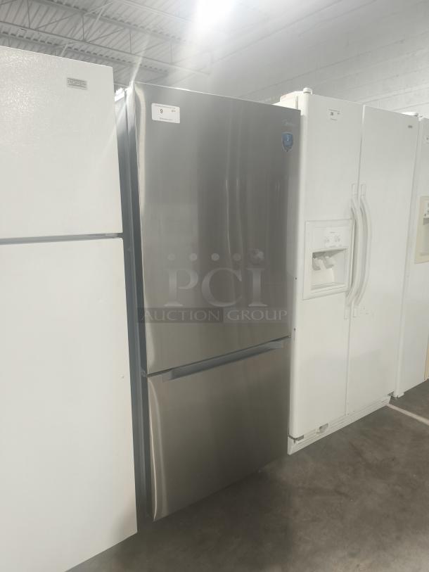 Midea 18.7 cu. ft. bottom-mount freezer refrigerator, model MRB19B7AST, new condition, stainless steel finish.