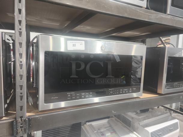 BRAND NEW GE Profile 2.1 cu ft Over-the-Range Microwave, Model PVM9005SJ8SS. Sensor cooking, minor scratches.