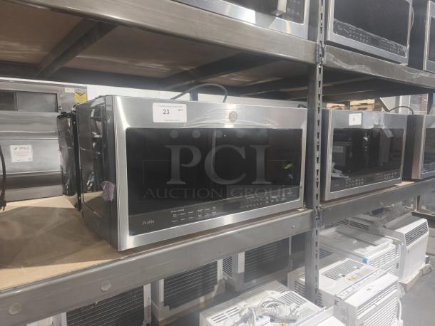 BRAND NEW GE Profile Over-the-Range Microwave, 2.1 cu ft, Model PVM9005SJ8SS, stainless steel, sensor cooking, minor dents.