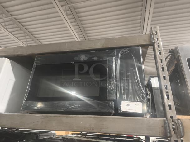 BRAND NEW SCRATCH AND DENT - GE 1.6 cu ft Over-the-Range Microwave Oven, model JVM3160DFBB, in original packaging.
