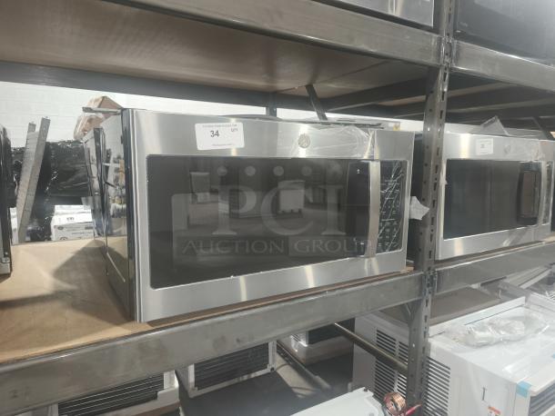 BRAND NEW GE 1.7 cu ft Over-the-Range Sensor Microwave, Model JVM6175SK6SS, stainless steel with minor scratches.