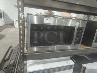 BRAND NEW SCRATCH AND DENT - GE 1.7 cu ft Over-the-Range Sensor Microwave Oven - Item #1214791
