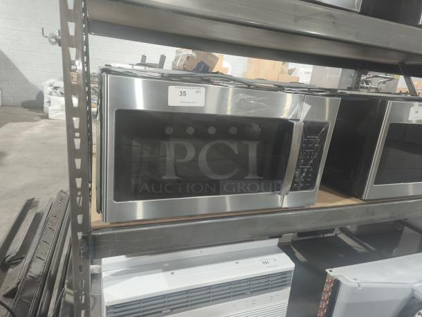 BRAND NEW GE 1.7 cu ft Over-the-Range Microwave, Model JVM6175SK6SS, stainless steel, minor scratches, sensor cooking.