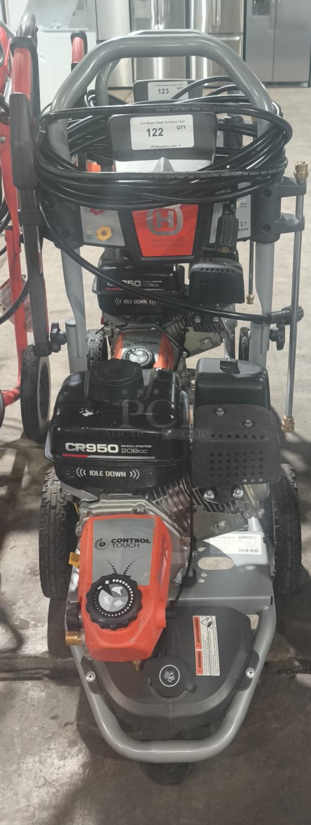 Husqvarna PW-3200 gas pressure washer, Model 022007, tested working, CR950 engine, 3200 PSI, control panel visible.