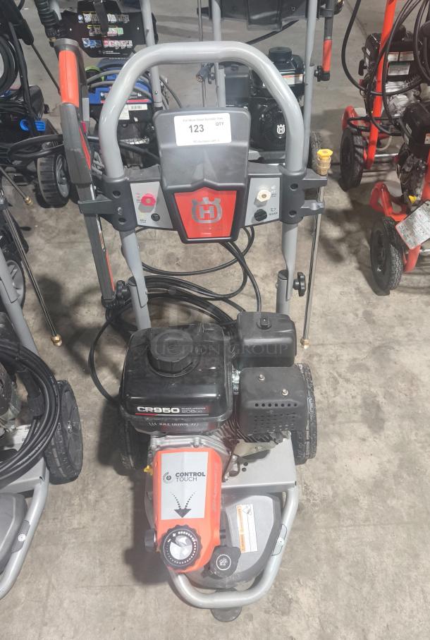 Husqvarna PW-3200 gas pressure washer, model 022007, 3200 PSI, with CR950 engine, tested and working, in good condition.