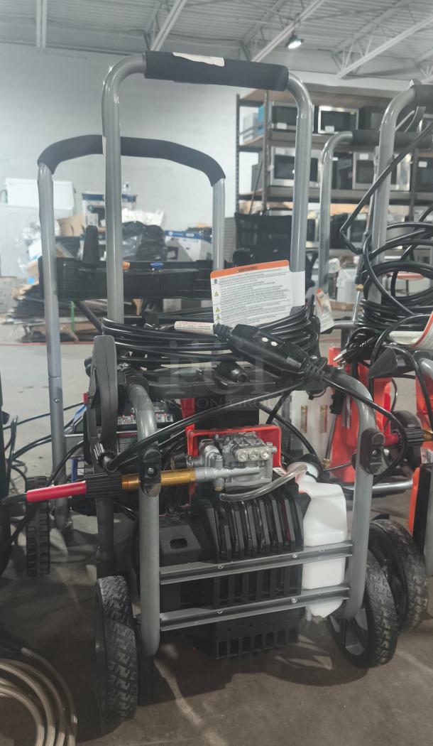 Husqvarna PW2300 Electric Pressure Washer, tested and working, with sturdy frame, hose, and nozzle. Clean, good condition.