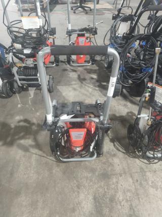 Husqvarna PW2300 Electric Pressure Washer, tested and working, with sturdy frame, coiled hose, and visible control panel.