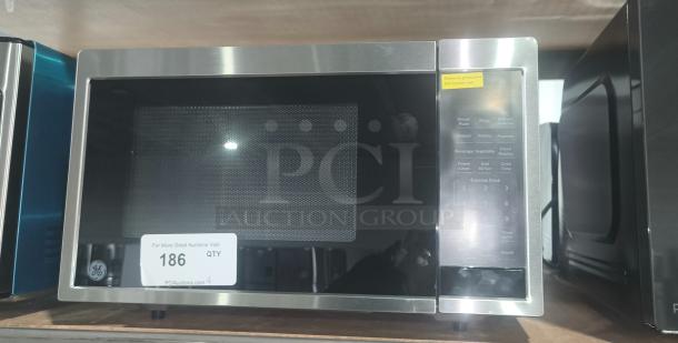 BRAND NEW GE 0.9 cu ft Countertop Microwave Oven, Model GCST09N1WSS, stainless steel, scratch and dent condition.