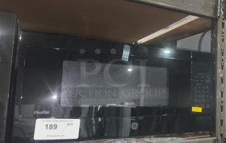 BRAND NEW SCRATCH AND DENT GE 1.1 Cu. Ft. Microwave Oven, Model GCST11N1WSS. Black finish, visible brands, tags, minor marks.