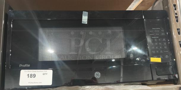 BRAND NEW SCRATCH AND DENT GE 1.1 Cu. Ft. Countertop Microwave Model GCST11N1WSS; minor exterior marks visible; unclear if label details functions.