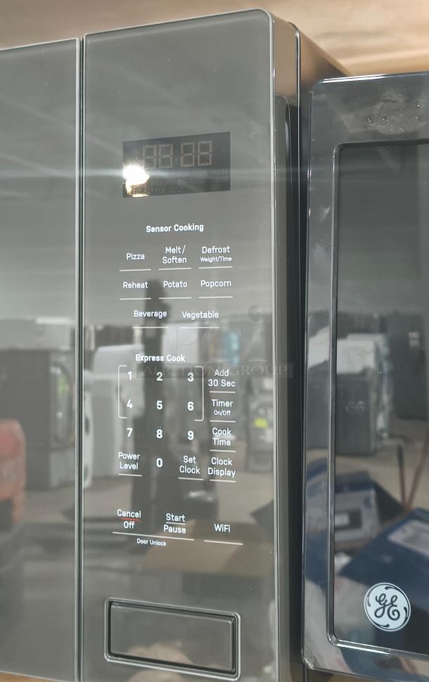 BRAND NEW GE Profile 2.2 cu ft Built-In Sensor Microwave Oven, Model PCWK22U1WDD, features digital display and sensor cooking.