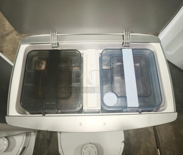 Ecovacs DEEBOT T10 OMNI Robot Vacuum Auto-Cleaning Station, visible water tanks labeled "dirty" and "clean," in good condition.