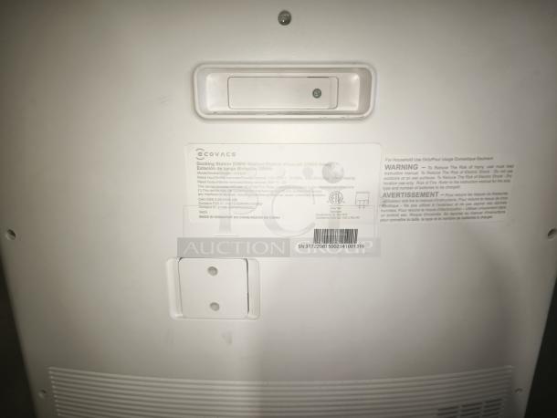Ecovacs DEEBOT T10 OMNI Robot Vacuum base with visible label detailing model 3444569, safety warnings, and certifications.