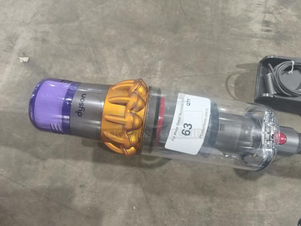 Dyson SV47 cordless vacuum with high suction, laser head, HEPA filtration, shown new with label indicating auction info.