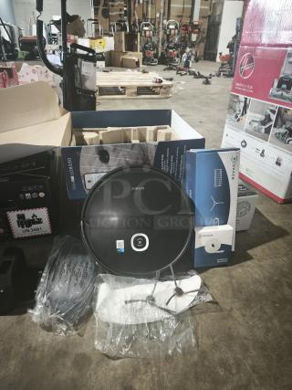 NEW ECOVACS DEEBOT U2 PRO vacuum and mopping robot in packaging. Includes accessories, brushes, and charger.
