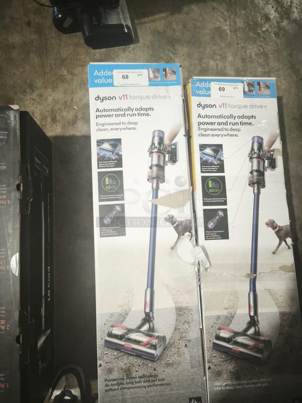 New Dyson V11 Torque Drive PLUS cordless stick vacuum in box, offers automatic power adjustment for deep cleaning. Model shown on packaging.