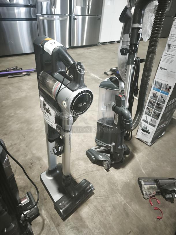 LG CordZero A9 A916BM cordless stick vacuum, tested and working, shown in used condition. Features silver finish and LG branding.