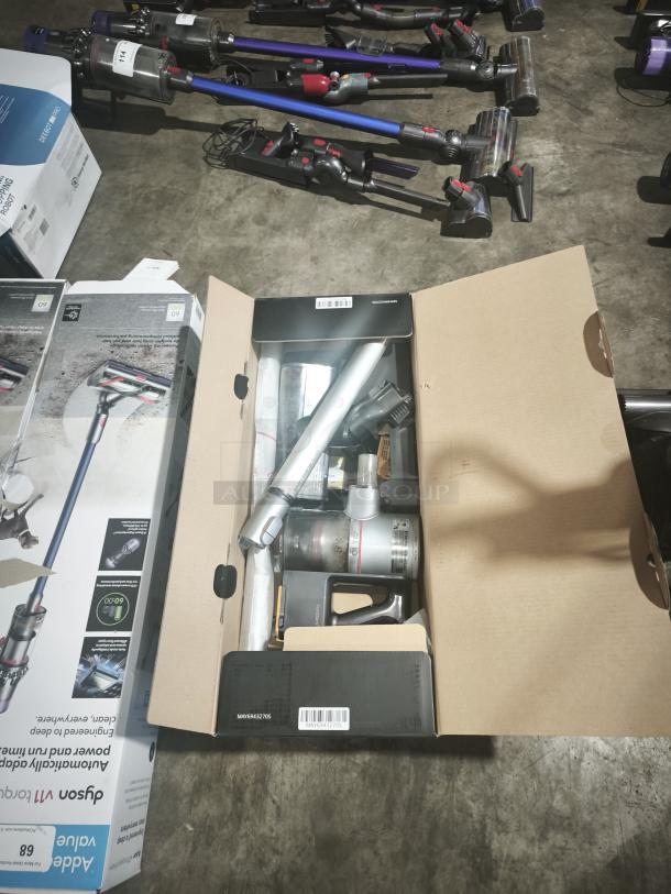 LG CordZero A9 Cordless Stick Vacuum, model A916BM, tested and working, in original packaging, includes attachments.