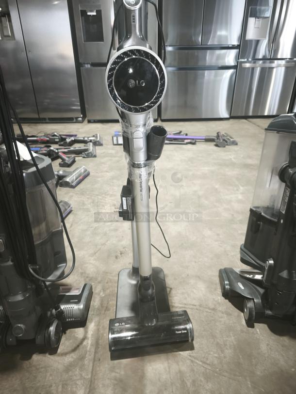 LG CordZero A9 cordless stick vacuum, model A916BM, tested and working, shown upright with attachments.